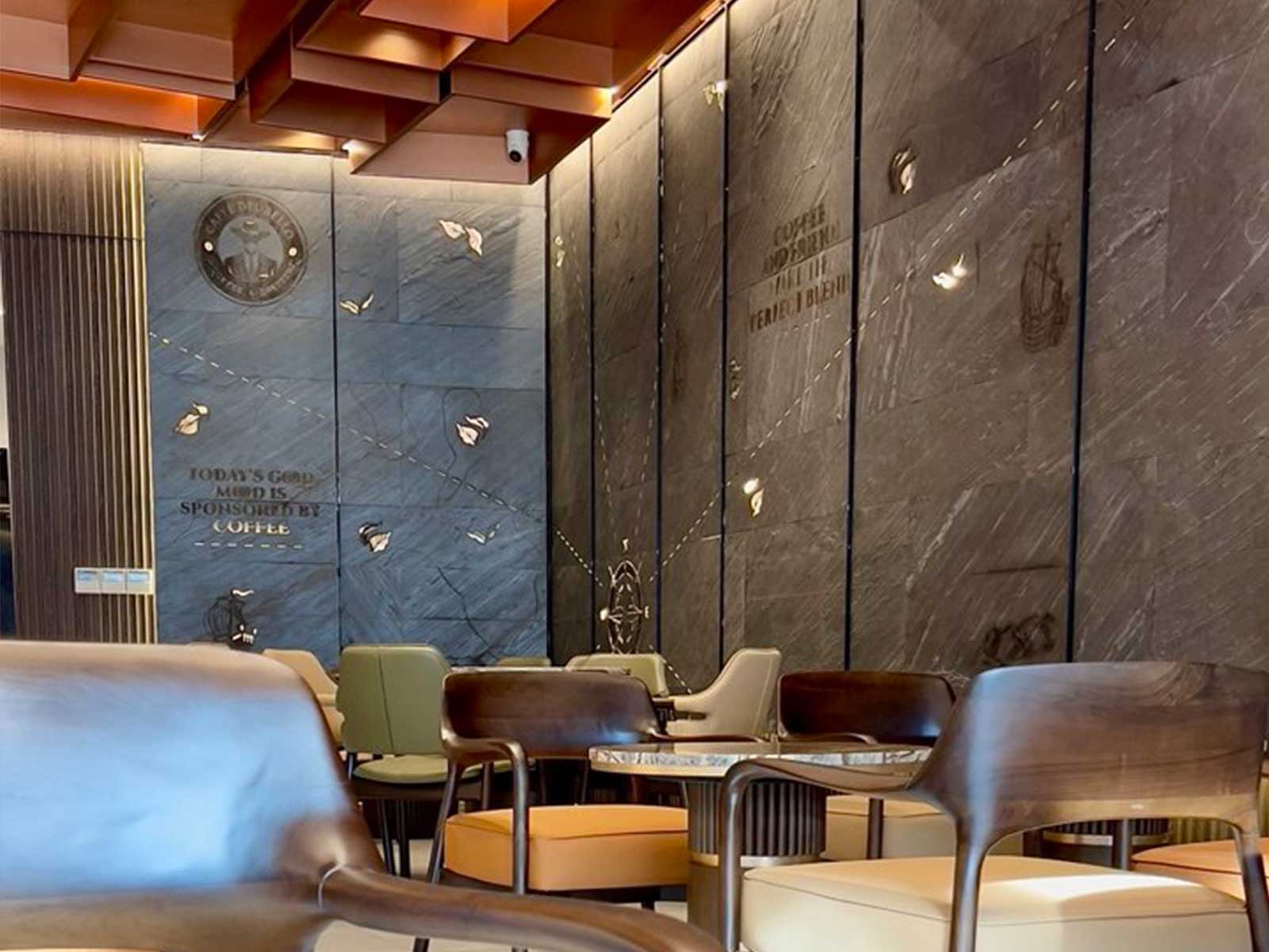 CAFE DEL BELLO Ark Silver porcelain flooring and terrazzo accents