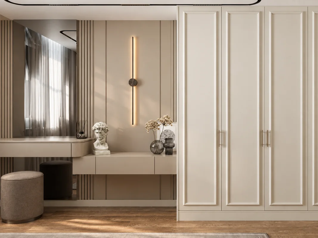 AD Flat dressing area with a floating vanity, large mirror and paneled wardrobe