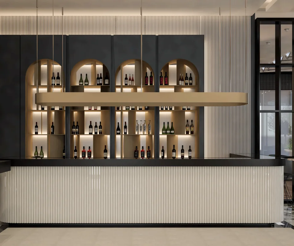 Ribbed service counter and illuminated arched shelves at Oasis Cadde Café