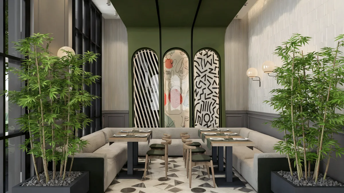 Oasis Cadde Café lounge with arched artwork and bamboo planters