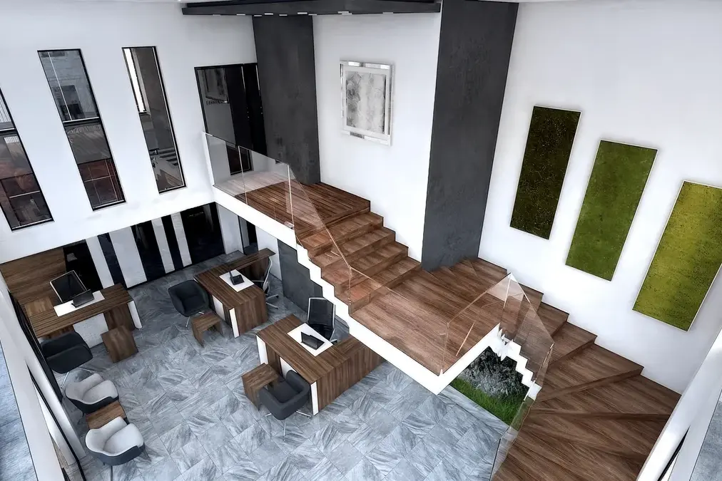 Akbaş İnşaat office with wood stairs, glass balustrades, black columns and workstations