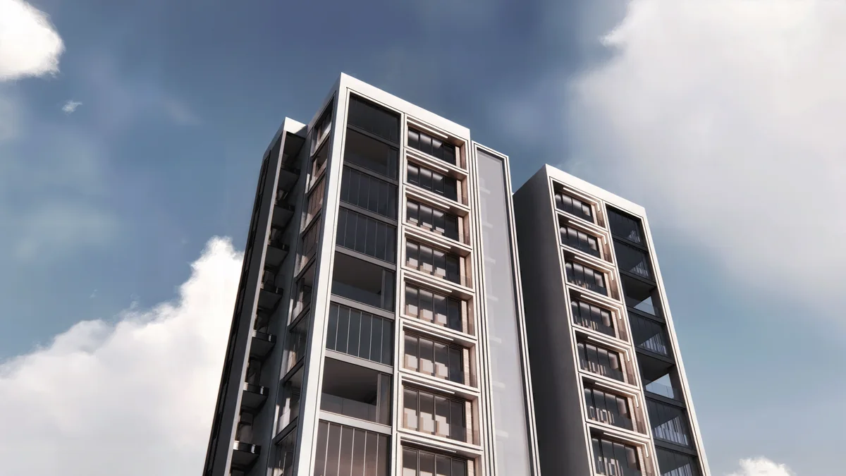 Doğa residential tower in Mersin with white facade frames, dark glazing and wood-toned panels