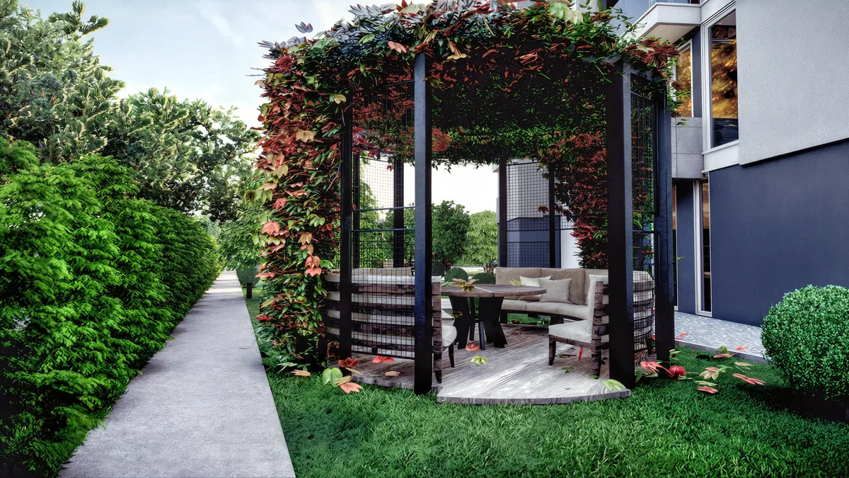 Doğa pergola interior with an L-shaped seat, table and climbing plants