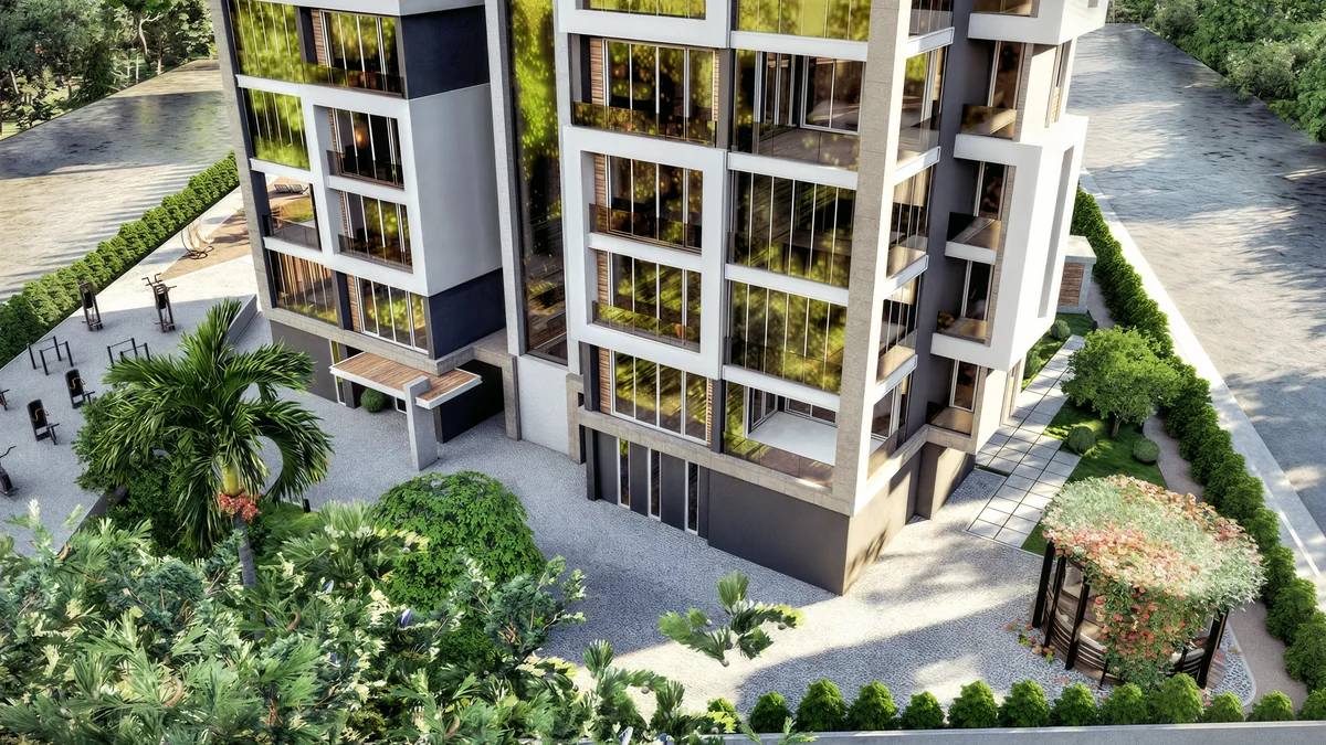 Doğa residential garden with paved paths, pergola seating and planting beside the building