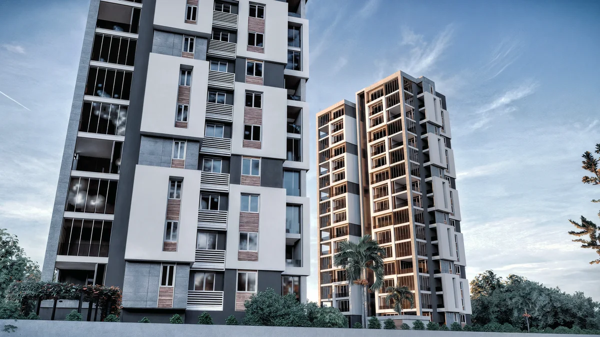 Two Doğa residential towers with white projecting frames and glazed balconies