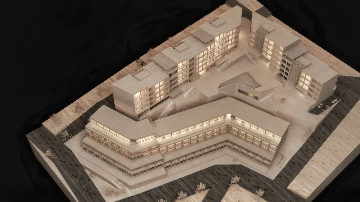 Aerial wooden-model view of Cennet Çınarcık residential blocks around a shared courtyard