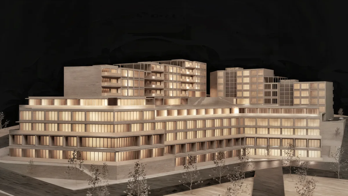 Front view of the Cennet Çınarcık wooden model with lower terraces and taller blocks behind