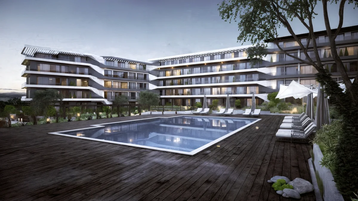 Cennet Yalova shared swimming pool and timber deck facing the residential courtyard