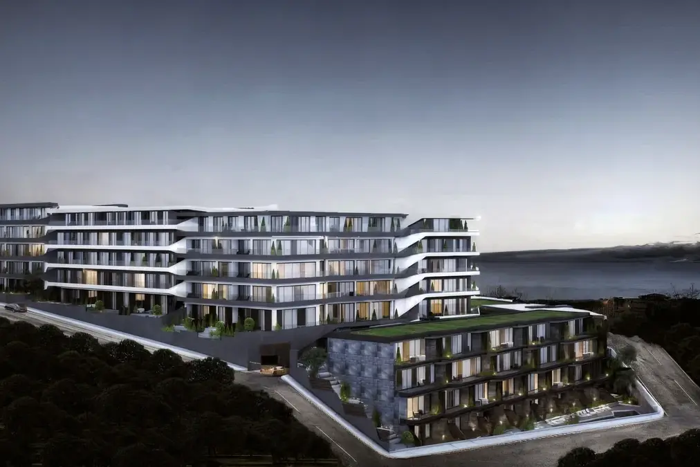 Cennet Yalova aerial perspective showing stepped residential blocks and a planted lower roof