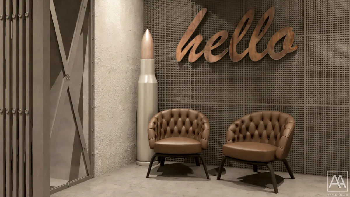 Brown tufted waiting chairs against a mesh wall and timber welcome sign