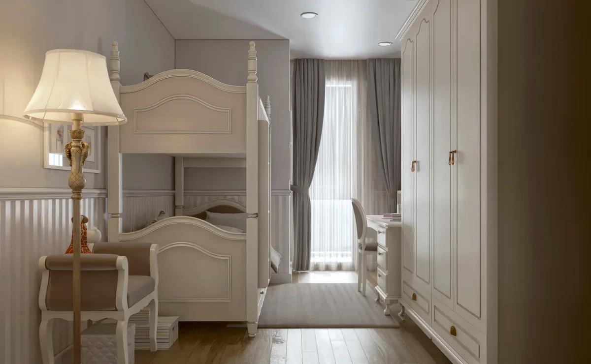 Merter children’s bedroom with a white bunk bed, tall wardrobe and desk near the window