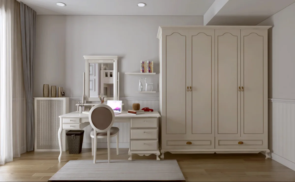 Merter children’s study desk beside a four-door wardrobe and open display shelves