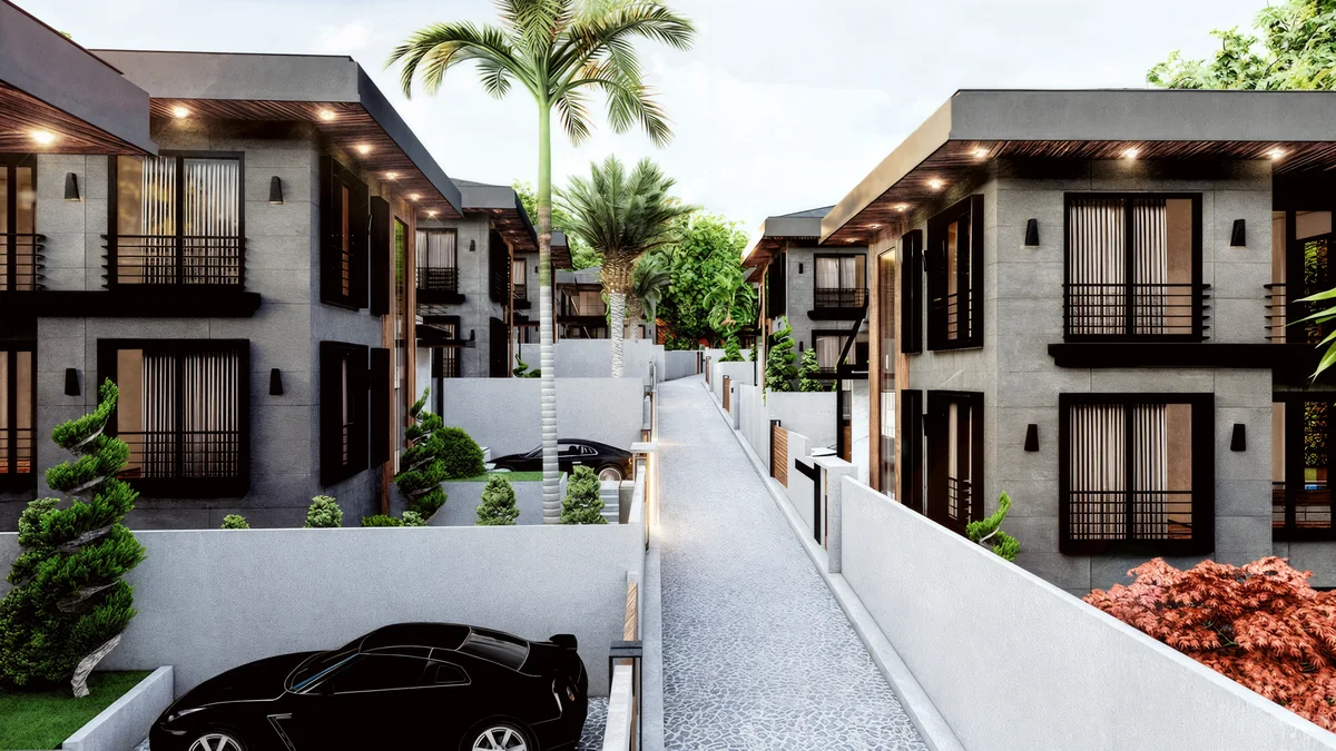 Lavies Şile access lane between stone-faced villas with black window frames and planted private entrances