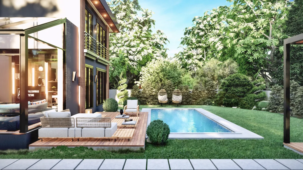 Lavies Şile villa pool beside a timber deck, corner glazing and a planted private garden