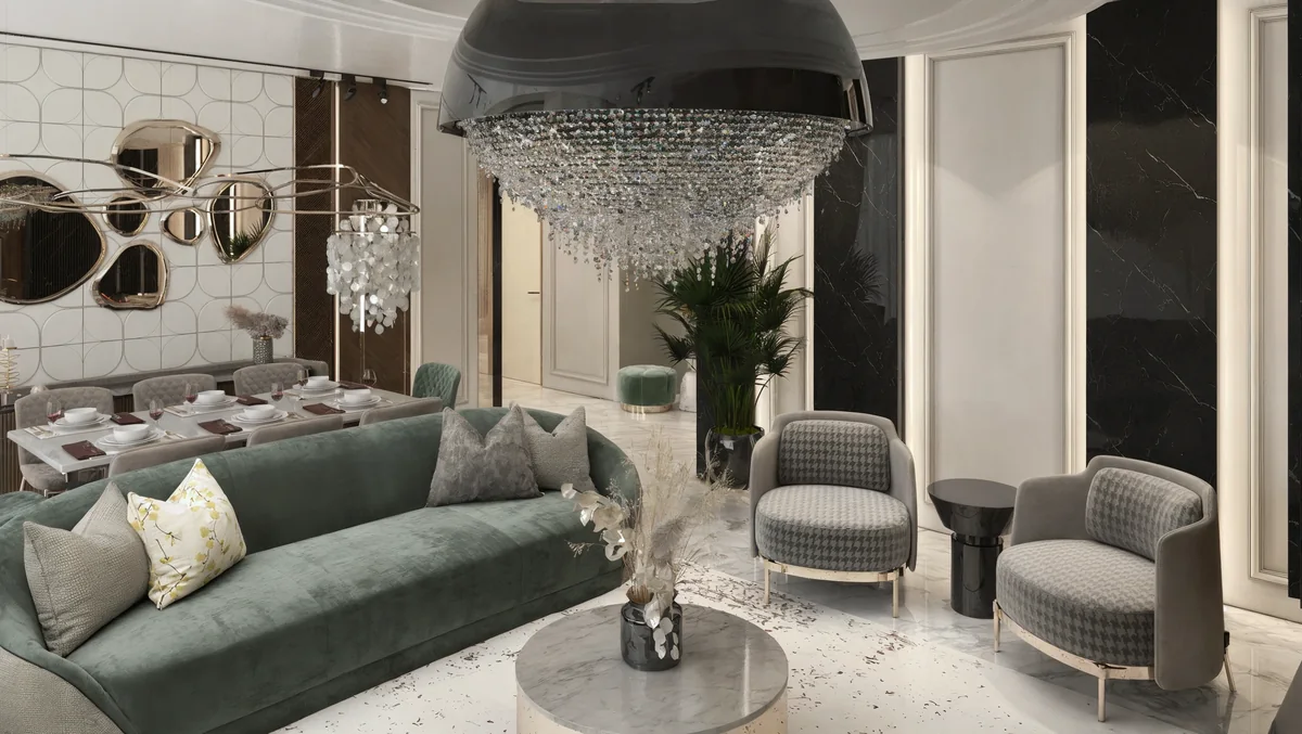 TUTKU villa living and dining space with green sofas, grey chairs and a sculptural pendant