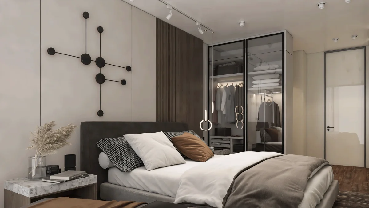 Neutral bedroom with a dark headboard, timber panels and an illuminated glass wardrobe