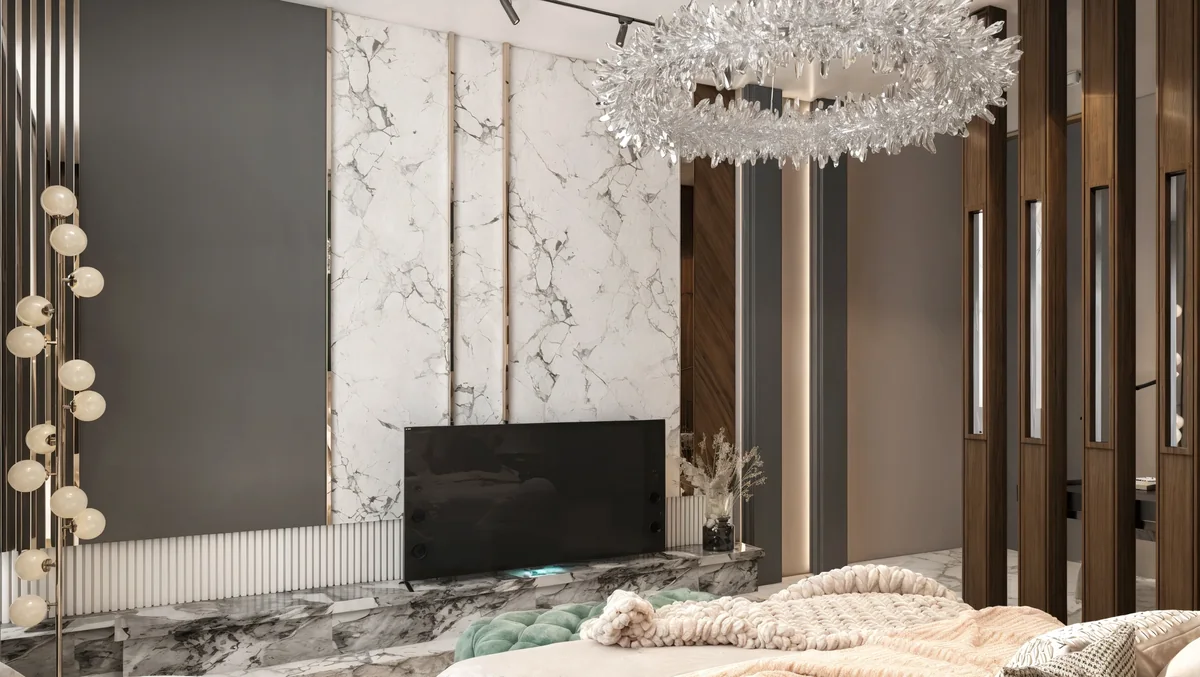 Timber room divider and marble television wall opposite the main bedroom bed