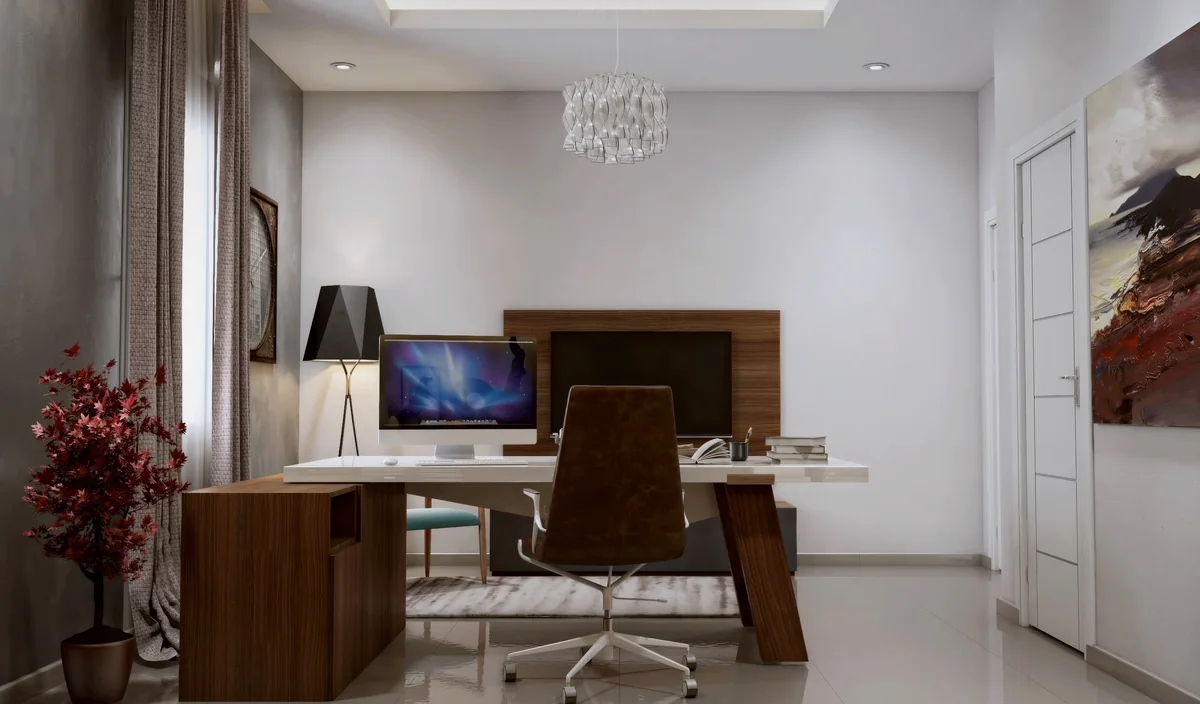 Dahlan Villa home office with a white and timber desk facing a media wall