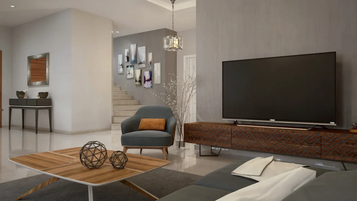 Dahlan Villa family lounge with patterned timber TV cabinetry beside the staircase